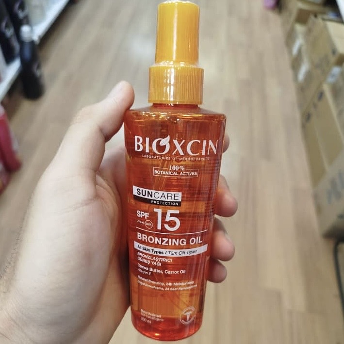 روغن برنزه‌کننده و ضد آفتاب با SPF 15 و آبرسانی قوی حجم ۲۰۰ میل